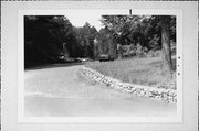S OF COUNTY HIGHWAY J, a NA (unknown or not a building) fence/wall, built in Woodruff, Wisconsin in 1937.