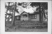 PINE ISLE RD, a Side Gabled resort/health spa, built in Three Lakes, Wisconsin in 1925.