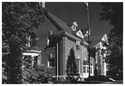 Antigo Public Library and Deleglise Cabin, a Building.