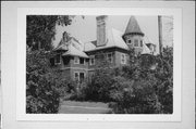 209 E FREDERICK ST, a Queen Anne house, built in Rhinelander, Wisconsin in 1892.