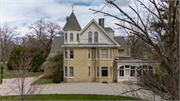 5000 W NATIONAL AVE, a Queen Anne house, built in Milwaukee, Wisconsin in 1868.