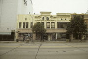 106, 108, 110 W COLLEGE AVE, a Italianate small retail building, built in Appleton, Wisconsin in 1880.