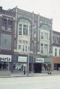 121-123 W COLLEGE AVE, a Queen Anne large retail building, built in Appleton, Wisconsin in 1897.