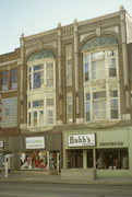 121-123 W COLLEGE AVE, a Queen Anne large retail building, built in Appleton, Wisconsin in 1897.