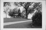 W755 WIS 96, a American Foursquare house, built in Kaukauna, Wisconsin in 1909.