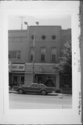 121 E COLLEGE AVE, a Commercial Vernacular small retail building, built in Appleton, Wisconsin in 1870.