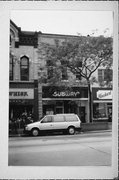 125 E COLLEGE AVE, a Italianate small retail building, built in Appleton, Wisconsin in 1890.