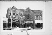 129 E COLLEGE AVE 129 E COLLEGE AVE, a Early Gothic Revival small retail building, built in Appleton, Wisconsin in 1873.
