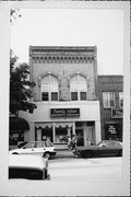 227 E COLLEGE AVE, a Italianate small retail building, built in Appleton, Wisconsin in 1900.