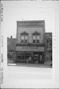 227 E COLLEGE AVE, a Italianate small retail building, built in Appleton, Wisconsin in 1900.