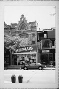 207 W COLLEGE AVE, a Early Gothic Revival retail building, built in Appleton, Wisconsin in 1885.