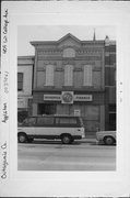 409 W COLLEGE AVE, a Italianate small retail building, built in Appleton, Wisconsin in 1889.