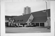 213 E WISCONSIN AVE, a Late Gothic Revival rectory/parsonage, built in Appleton, Wisconsin in 1939.