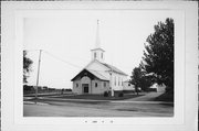 E MAIN ST AT OLK, a Greek Revival church, built in Hortonville, Wisconsin in 1892.