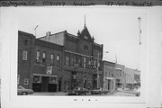 137-139-141 E 2ND ST, a Romanesque Revival large retail building, built in Kaukauna, Wisconsin in 1895.