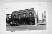 148, 150, 152 E 2ND ST, a Romanesque Revival blacksmith shop, built in Kaukauna, Wisconsin in 1889.