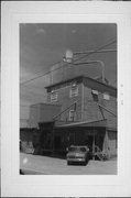 213 E WISCONSIN ST, a Astylistic Utilitarian Building mill, built in Seymour, Wisconsin in 1907.