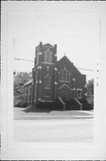 SE CORNER OF BROAD AND PINE STS, a Late Gothic Revival church, built in Shiocton, Wisconsin in .