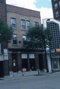 117-119 E MIFFLIN ST, a Italianate retail building, built in Madison, Wisconsin in 1869.