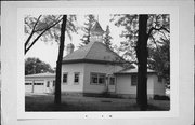 N SIDE OF PLEASANT VALLEY RD, .2 MI W OF COVERED BRIDGE, a Octagon school-one to six room, built in Cedarburg, Wisconsin in 1904.