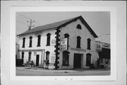 1329 (AKA 1327) WISCONSIN AVE, a Commercial Vernacular blacksmith shop, built in Grafton, Wisconsin in 1868.