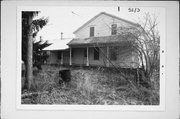 7410 W MEQUON RD / STATE HIGHWAY 167, a Gabled Ell house, built in Mequon, Wisconsin in 1860.