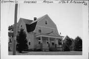 11936 N PORT WASHINGTON RD, a Dutch Colonial Revival house, built in Mequon, Wisconsin in 1917.