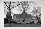 409 W GRAND AVE, a Colonial Revival/Georgian Revival house, built in Port Washington, Wisconsin in 1928.