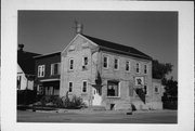 601 N WISCONSIN ST, a Greek Revival tavern/bar, built in Port Washington, Wisconsin in 1865.