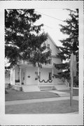 147-149 S WISCONSIN ST, a Queen Anne house, built in Port Washington, Wisconsin in 1900.
