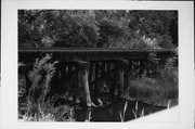 NW QUADRANT OF THE VILLAGE OF THIENSVILLE (over Pigeon Creek), a bridge, built in Thiensville, Wisconsin in 1871.