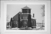 W5706 State Highway 72 , a Late Gothic Revival house of worship, built in Ellsworth, Wisconsin in 1915.