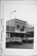 BROADWAY, N, 236, EAST ELLSWORTH, a Commercial Vernacular small retail building, built in Ellsworth, Wisconsin in 1900.