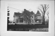 LOCUST ST, 140, AT ORANGE ST, NE CNR, a Queen Anne lodging-hotel, built in Prescott, Wisconsin in 1907.