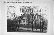 LOCUST ST, 140, AT ORANGE ST, NE CNR, a Queen Anne lodging-hotel, built in Prescott, Wisconsin in 1907.