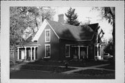 403 E MAPLE ST, a Gabled Ell house, built in River Falls, Wisconsin in 1869.