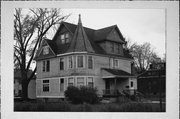 320 E ELM ST, a Queen Anne house, built in River Falls, Wisconsin in 1894.