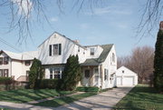 7018 HUBBARD AVE, a Colonial Revival/Georgian Revival duplex, built in Middleton, Wisconsin in 1937.