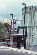 913-925 MAIN ST, a Romanesque Revival retail building, built in Stevens Point, Wisconsin in 1885.