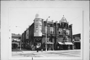 904, 916-24 MAIN ST, a Queen Anne large retail building, built in Stevens Point, Wisconsin in 1890.