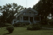 117 W STATE ST, a Greek Revival house, built in Burlington, Wisconsin in 1848.