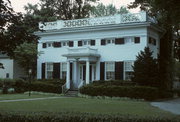 117 E STATE ST, a Greek Revival house, built in Burlington, Wisconsin in 1846.