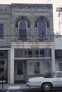 409 6TH ST, a Commercial Vernacular retail building, built in Racine, Wisconsin in 1865.