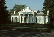 1247 MAIN ST, a Greek Revival house, built in Racine, Wisconsin in 1842.