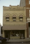 237 MAIN ST, a Romanesque Revival small retail building, built in Racine, Wisconsin in 1902.