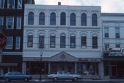 205-207 6TH ST, a Italianate retail building, built in Racine, Wisconsin in 1863.