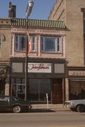 318 MAIN ST, a Commercial Vernacular small retail building, built in Racine, Wisconsin in 1876.