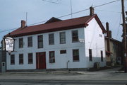 205 W MAIN ST, a Greek Revival lodging-inn, built in Rochester, Wisconsin in 1843.