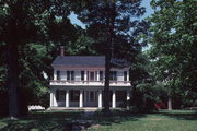 108 N STATE ST, a Greek Revival house, built in Rochester, Wisconsin in 1847.