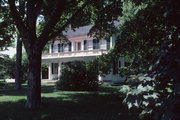 108 N STATE ST, a Greek Revival house, built in Rochester, Wisconsin in 1847.
